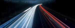 Motorway by night high speed cars Low Carbon Technology Grant Funding